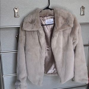 Stylish fur jacket...it’s a medium